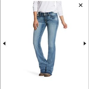 R.E.A.L Mid Rise Meg Stretch Boot Cut Jean. New without tags. Size 27 R.